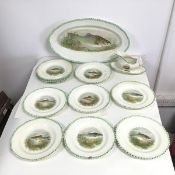 A set of twelve 1930s Woods Ivoryware fish plates, each plate with freshwater fish to base of well