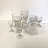 A collection of 19thc and later crystal drinking glasses including sherry glasses, port glasses