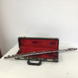 An Artley, Elkhart-Ind flute, in three parts and includes original box (flute: 67cm)