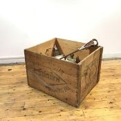 A large wooden storage box, by the Take me Match Company, London, with rope handles, enclosing