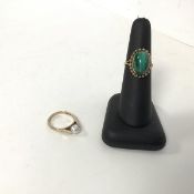 A 9ct gold ring set polished oval malachite surrounded by a twist (L) and a 9ct gold ring set