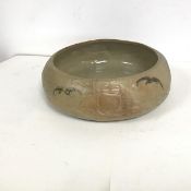 A large Victory Ware bowl, with partially glazed exterior, with ships at sea and birds, with