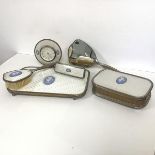 A 1950s/60s toiletry set including a hairbrush, a clothes brush, a vanity mirror, a jewellery box (