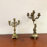A 20thc brass candelabra, the five branches with drip trays supported by a depiction of Venus,