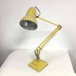 A mid 20thc anglepoise table lamp stamped Herbert Terry & Sons Ltd., on a two tier base, painted
