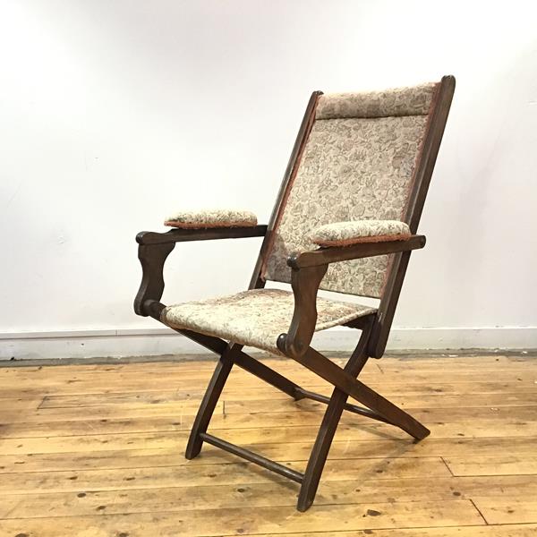 A late 19thc folding campaign style chair, bears metal badge to the reverse with the Babveystock, by