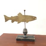 A New England style weather vane, the gilded metal salmon raised on a turned pole with ball