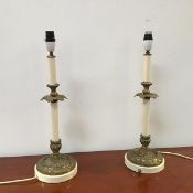 A pair of mid 19thc brass and painted candlesticks, each with fluted column, pierced foliate