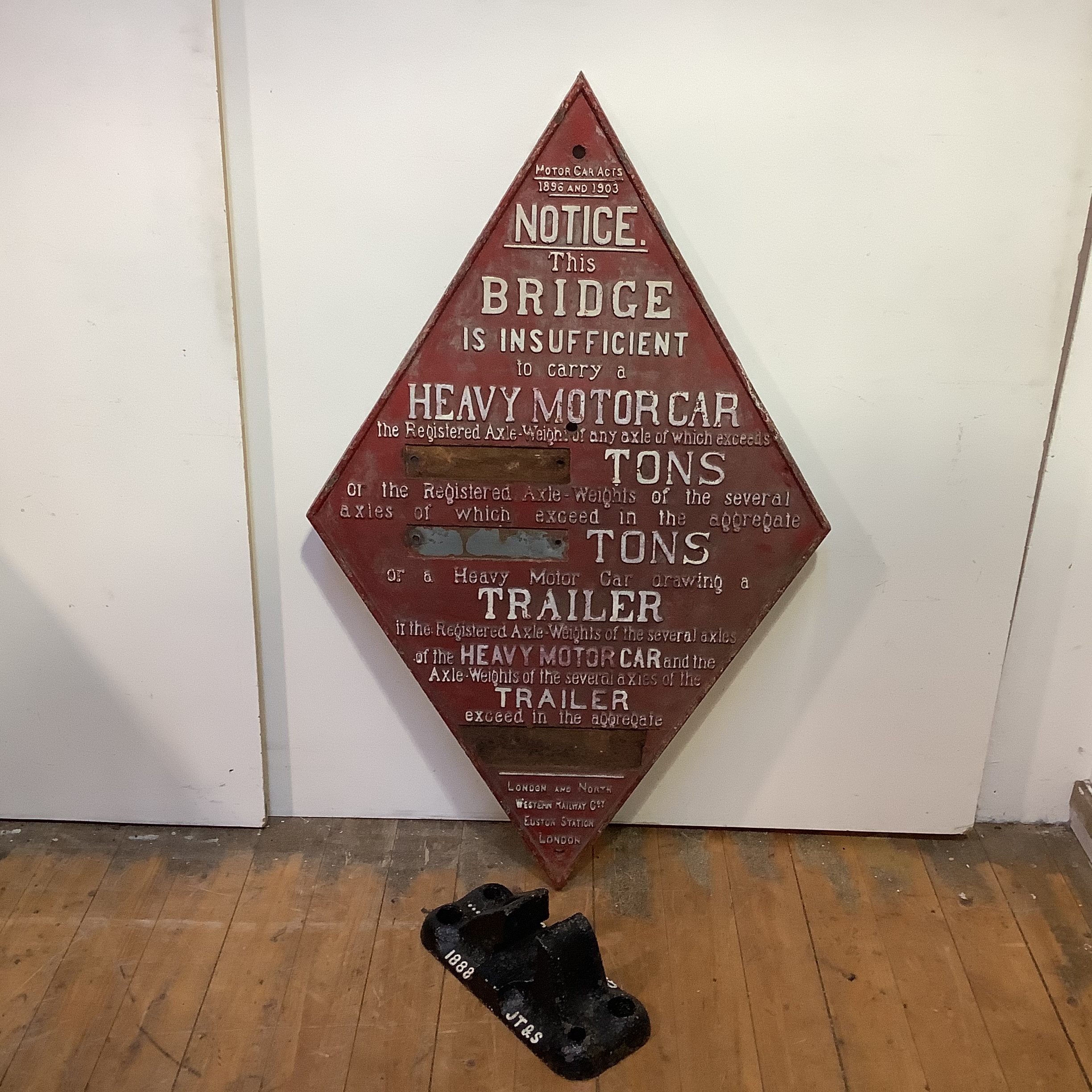 A large London & North Western Railway cast iron diamond-shaped restriction sign, early 20th century