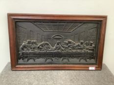 A Coalbrookdale cast iron plaque depicting The Last Supper, after Leonardo da Vinci, in an oak