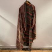 A machine-woven Paisley woollen shawl, worked in parallell bands in greens, reds and blues. 155cm by