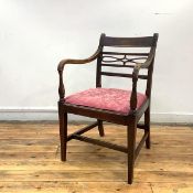 A Scottish Regency mahogany elbow chair, in the manner of Francis Braidwood, with stylised ribbon