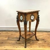 A mid-19th century satinwood and ormolu mounted table in the Louis XVI taste, the hinged top with