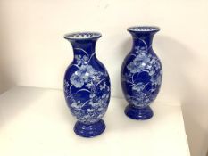 A pair of large Japanese blue and white porcelain vases, possibly Seto, c. 1900, of baluster form,