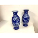 A pair of large Japanese blue and white porcelain vases, possibly Seto, c. 1900, of baluster form,