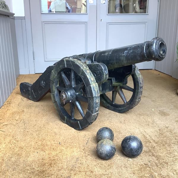 A large cast-iron model signalling cannon, the ringed 33" barrel (excluding cascabel), mounted on
