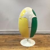 A 1960's plastic bin, of egg shape, with three folding capsules, on a swivel base. 86cm by 39cm