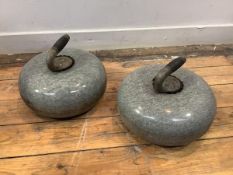 A pair of grey granite curling stones; together with a facsimile of "Curling Ye Glorious Pastime",