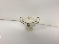 A small armorial creamware pedestal bowl and cover, c. 1800, possibly a sucrier, of urn form, the