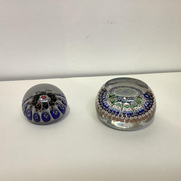 Two Millefiori paperweights: the first, faceted, with flat top, possibly Whitefriars; the other of