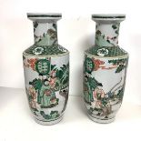 A pair of large Chinese famille verte porcelain vases, of shouldered baluster form, each painted