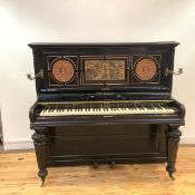 A 19th century upright piano in the Aesthetic taste by J&J Hopkinson, London, the straight strung