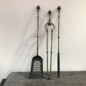 A set of three 19th century steel fire irons, each with acorn terminal and knopped stem, poker,