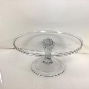 A George III glass tazza, c. 1770, the circular galleried dish on a reeded tapering baluster stem,