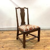 A Scottish George II mahogany dining chair, c. 1740, the yoke shaped top rail and baluster splat