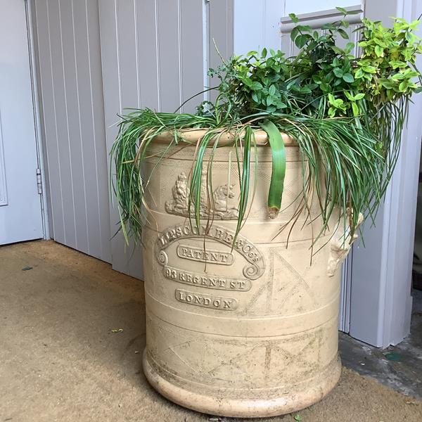 A Victorian glazed stoneware cistern, by Lipscomb & Co. 93 Regent St., London, of cylindrical