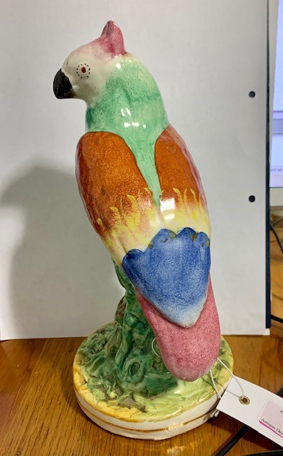 A 19th century Staffordshire model of a parrot, modelled seated on a stump, polychrome painted in - Image 2 of 4