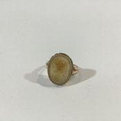 An intaglio ring, the oval intaglio modelled with the bust of a Classical helmeted figure, on a
