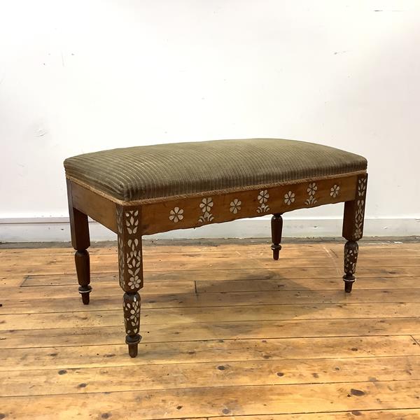 A 19th century mahogany and mother-of-pearl inlaid long stool, the velvet-upholstered seat above a