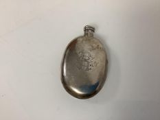 An early Victorian silver scent flask, London 1839, oval, with screw top, engraved with a