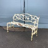 A Victorian rustic pattern cast iron bench, in Coalbrookdale style, the pierced back and seat formed