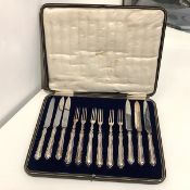 A cased set of six George V silver-handled fruit knives and forks, William Hutton & Sons Ltd.,