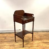 A Regency mahogany washstand, in the manner of Gillows, the 3/4 gallery above a dished soap recess