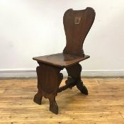 A mahogany George II style compass pattern hall chair, 19th century, the cartouche-shaped back and