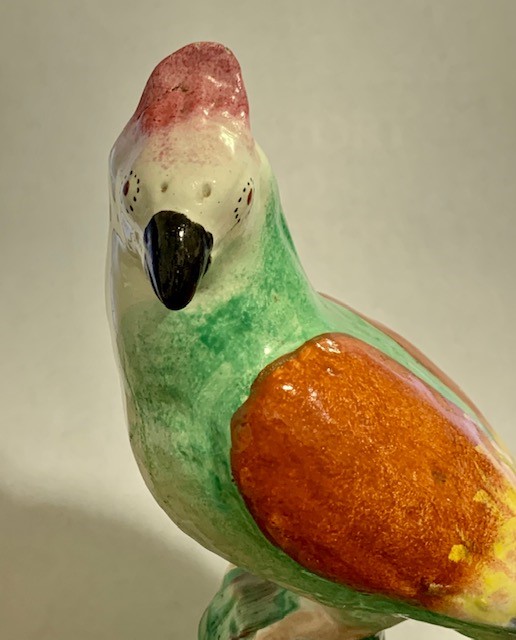 A 19th century Staffordshire model of a parrot, modelled seated on a stump, polychrome painted in - Image 3 of 4