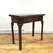 A George II mahogany tea table, c. 1740, of small proportions, the hinged top above a frieze drawer,