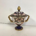 An early 20th century Royal Crown Derby vase and cover of "Warwick" shape, in Imari pattern no.
