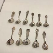 A group of eleven 20th century Scandinavian silver commemorative spoons comprising: five Norwegian