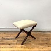 A mid-19th century rosewood footstool, the padded seat with calico upholstery, raised on X-frame