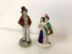 A mid-19th century Staffordshire Temperance "Water & Gin" figure, double-sided on an oval base;