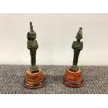 A pair of Grand Tour bronzes in the style of Egyptian antiquities, 19th century, a figure of