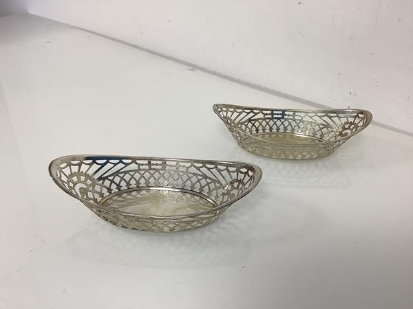 A pair of Edwardian silver sweetmeat baskets, Levi & Salaman, Birmingham 1907, of navette form,