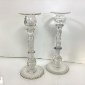 A pair of Regency cut-glass candlesticks, early 19th century, each with thumb-cut baluster candle-
