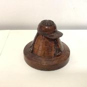 An unusual treen inkwell, second half of the 19th century, the hinged cover carved as a jockey's