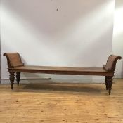 An impressive William IV mahogany hall bench, of country house proportions, the outswept arms with