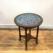 An Aesthetic Movement occasional table, c. 1890, the circular top inset with Iznik pottery tiles,